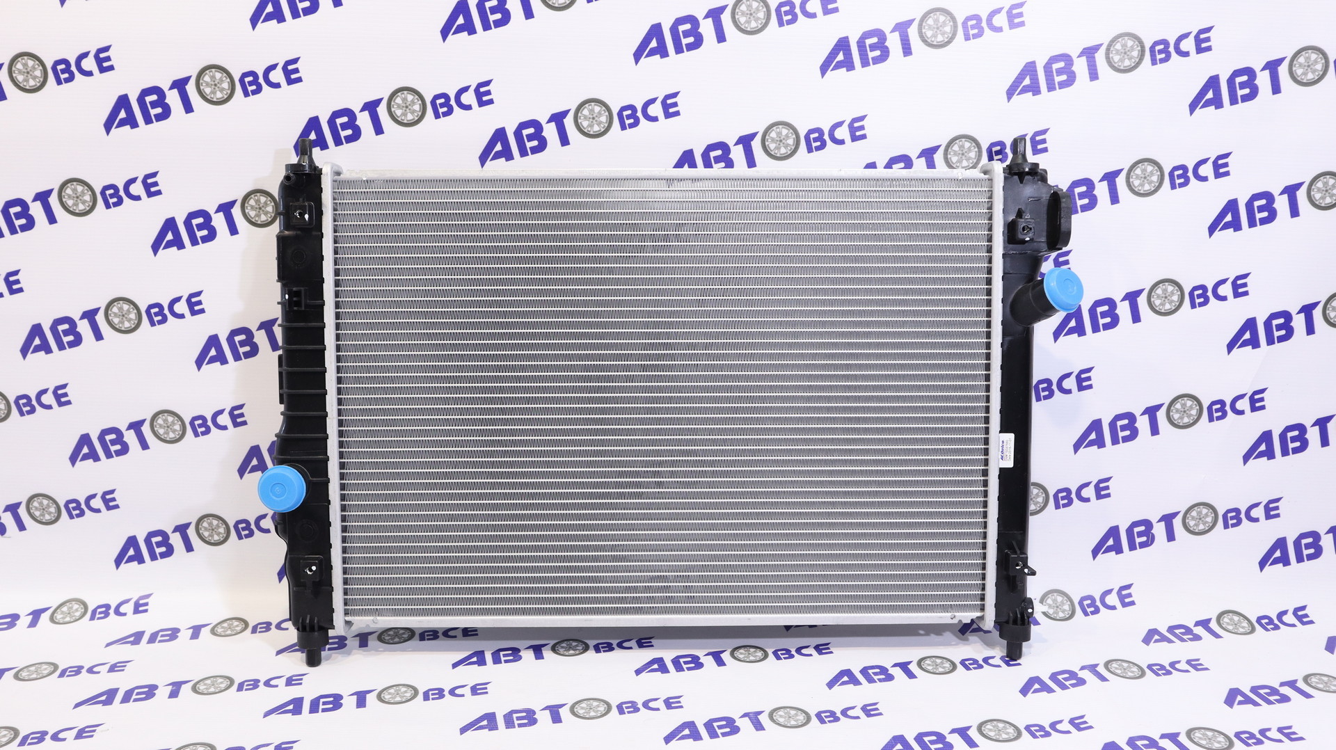 Радиатор основной (охлаждения) Aveo T255 HB МКПП 1,2 16V (Нового Образца косоой выход) ACDELCO